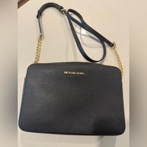 Michael Kors Elegant Black Crossbody Bag with Gold Accents